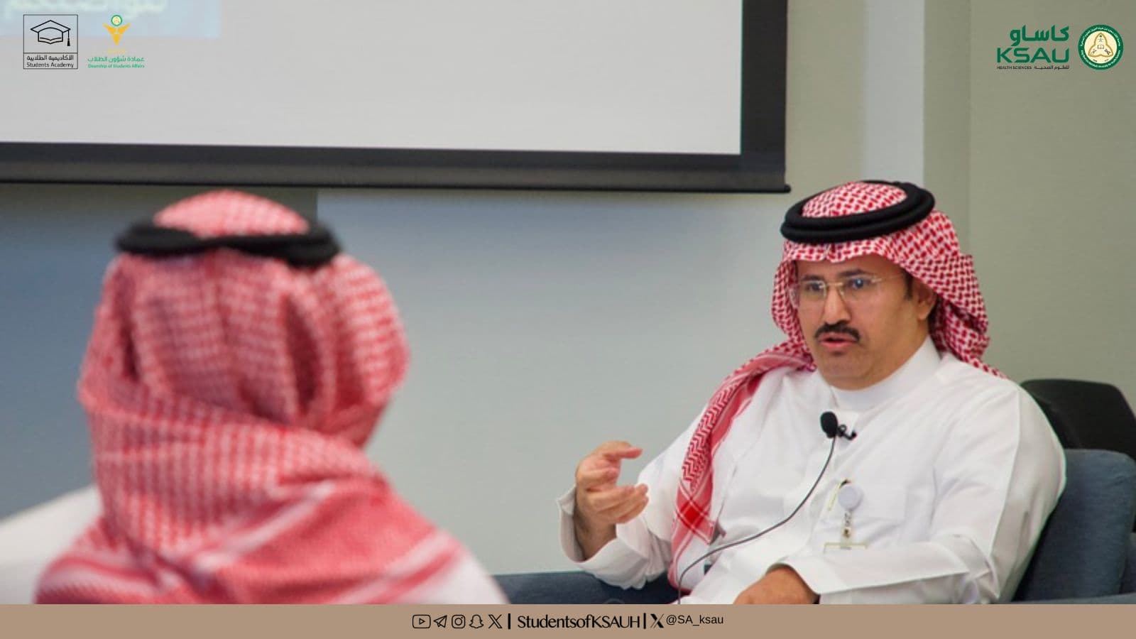 A speaker sharing their experience during a Student Academy panel discussion